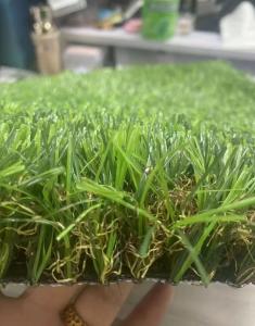 China Synthetic Grass 40mm Height School Soccer Lawn Artificial Turf Roll Green Artificial Grass Carpet for Football Field on sale