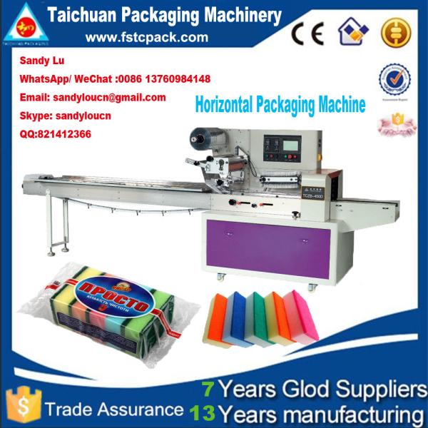 Horizontal packaging machine for sponge , scourer, foam, baorbent cloth