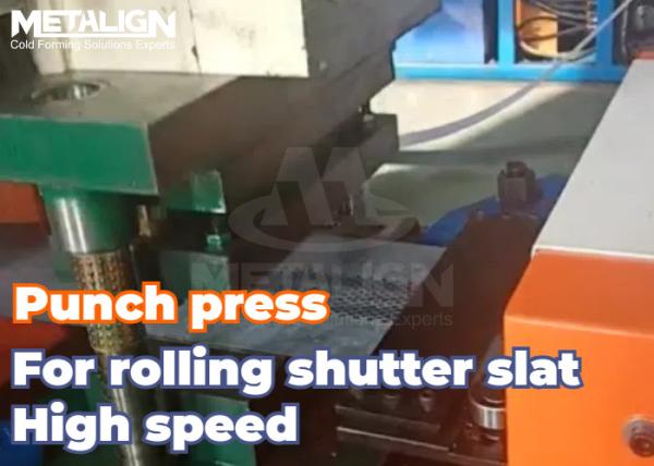 Quality Servo Feeding Punching Shutter Door Roll Forming Machine For Perforated Shutter Profiles for sale