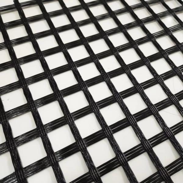 Asphalt Reinforcement Bitumen Coated Fiberglass Biaxial Geogrid Landfill And Embankment Support
