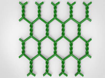 A piece of double twisted PVC coated gabion on the gray background.