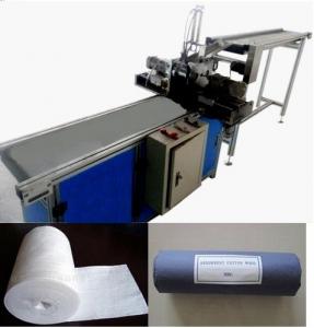 China Absorbent Cotton Roll Cutting and Rolling Machine on sale