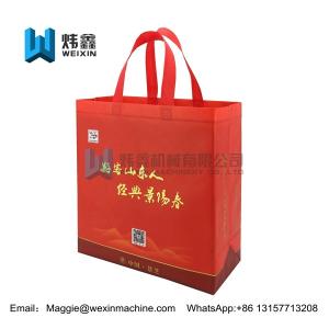 China Customized Red Eco Non Woven Bags With Tote Handles Foldable Bag 100gsm on sale