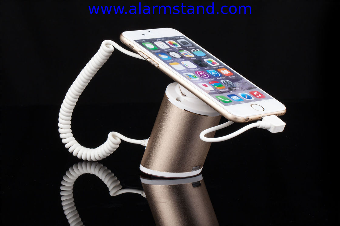 COMER High quality Rotating display stand for phone with charging cable and alarm sensor