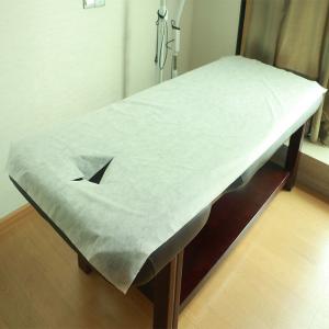 Buy cheap Dispoable Spunbond Non Woven Massage Table Bed Sheet With Facial Hole Pink Blue Color product