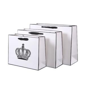 China 230GSM Shopping Holiday Gift White Custom Printed Paper Bags on sale