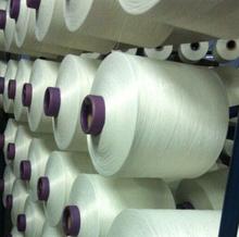 China Knitting Polyester Spun Yarn Cone Package Polyester Blended Yarn on sale