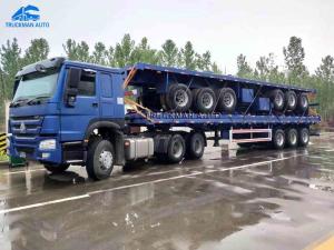 China T700 Steel 40 Ton 3 Axle Flatbed Container Trailer on sale