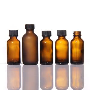 China 15ml 30ml Airless Boston Glass Lotion Bottles With Black Polycone Cap on sale
