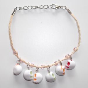 China Ceramic Skull Heads Charm String Bracelets for Girls, Wholesale Ceramic Skulls Drop Pendants Woven Bracelets on sale