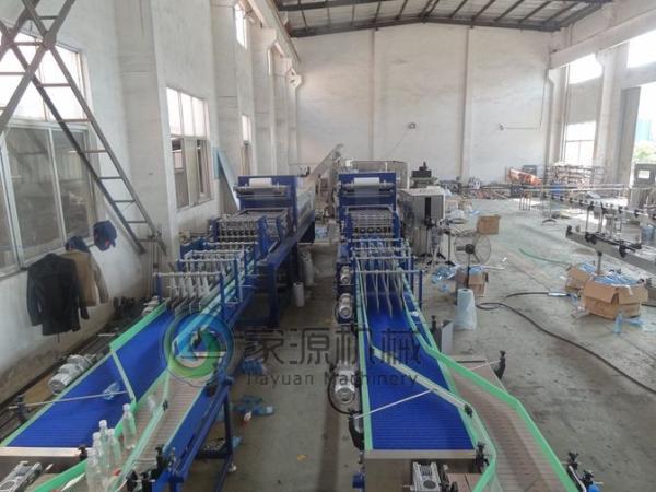 Quality Auto Shrink Wrapper Machine 500ml Curved Bottle Packing Equipment for sale