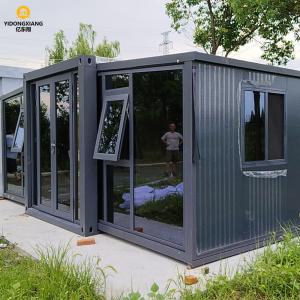 China Double Winged Foldable Container House Durable Sandwich Panel Steel Container Buildings on sale