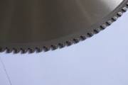 Close-up of saw blade teeth design