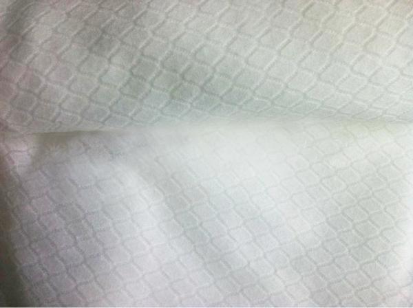 Quality Embossed 70gsm White Spunlace Nonwoven Wipes Non Woven Fabric Roll for sale