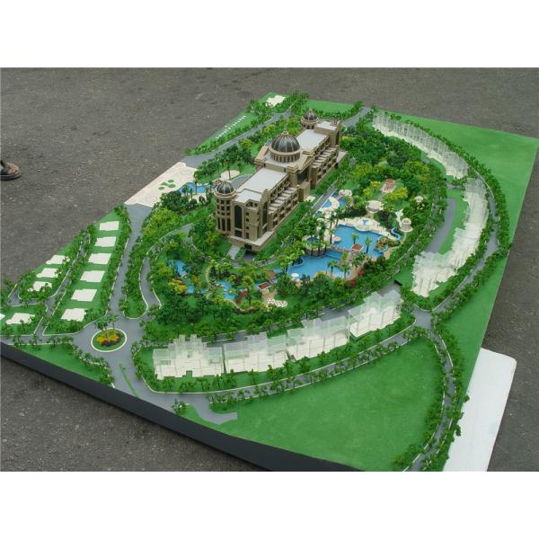 Physical scale model with warm lighting for building construction presentation