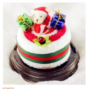 China New creative promotion gift product wedding gift christmas cake shape towel on sale