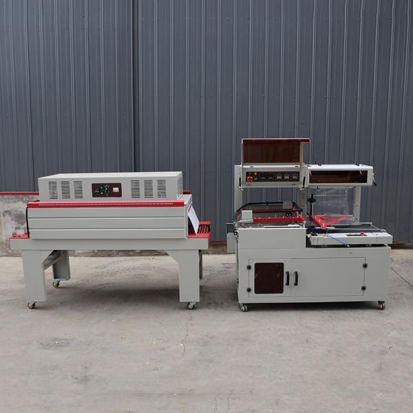 Quality Compact L Shape Shrink Wrap Packaging Machine Voltage 380V 440V for sale