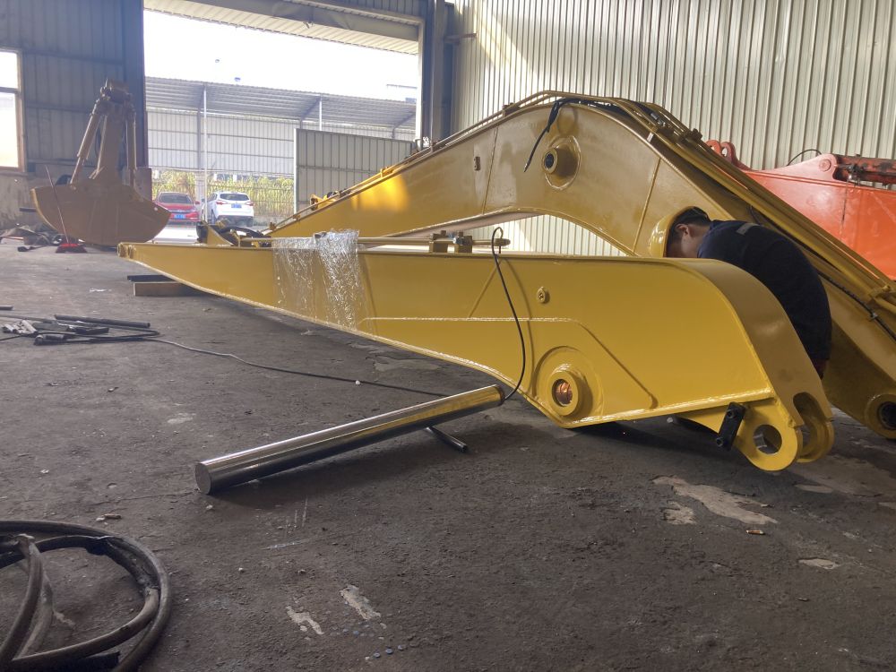 Excavator extension arm for foundation pit, caisson, basement excavation