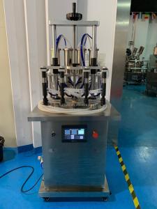 China Semi Automatic Perfume Filling Machine with Negative Pressure Filling on sale