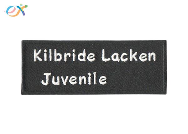 Quality Black Bottom White Words Embroidered Fabric Patches Polyester Material for sale