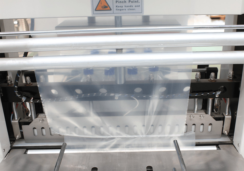 380v Shrink Packing Machine 6-8 packs/min Shrink Wrap Machine For Bottles