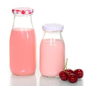 China Custom Printed Recycled Glass Milk Bottles 1l Clear Transparent on sale