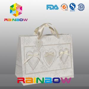 China Unique Design White / Red Custom Printed Paper Bags With Handle on sale