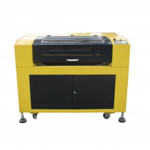 China 1390 6090 Co2 Laser Cutting Machine Plastic Rubber CNC Laser Engraving Machine on sale