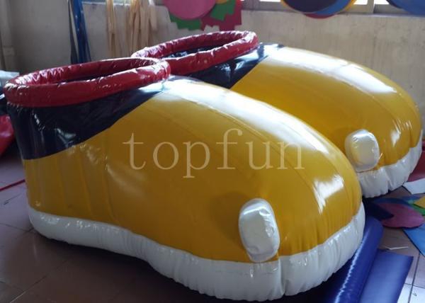 Quality Yellow PVC Inflatable Shoes For Walking Race Interesting Inflatable Soccer Field for sale
