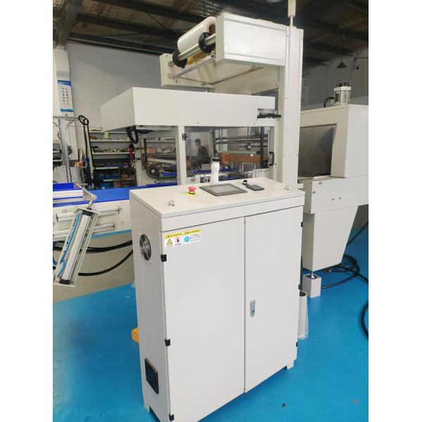 Straight-line heat-shrink packaging machine
