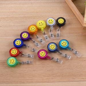 China plastic smiley face badge reel on sale