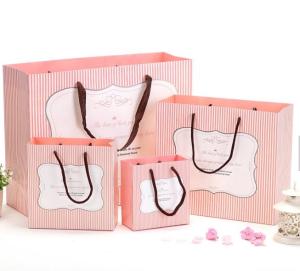 China Beautiful Custom Printed Paper Bags Art Paper Material Any Size Available on sale