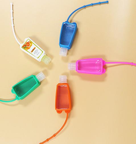Quality 30ml Flip Cap Empty Hand Sanitizer Bottle With Silicone Holder Pocket for sale