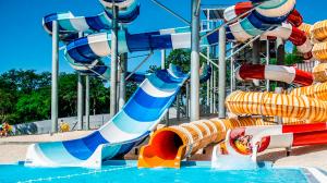 China Commercial Water Park Swimming Pool Design Rainbow Fiberglass Slide Set on sale