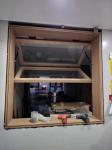 Flow Fireplace Proximity Folding Window Providing Controlled Ventilation During