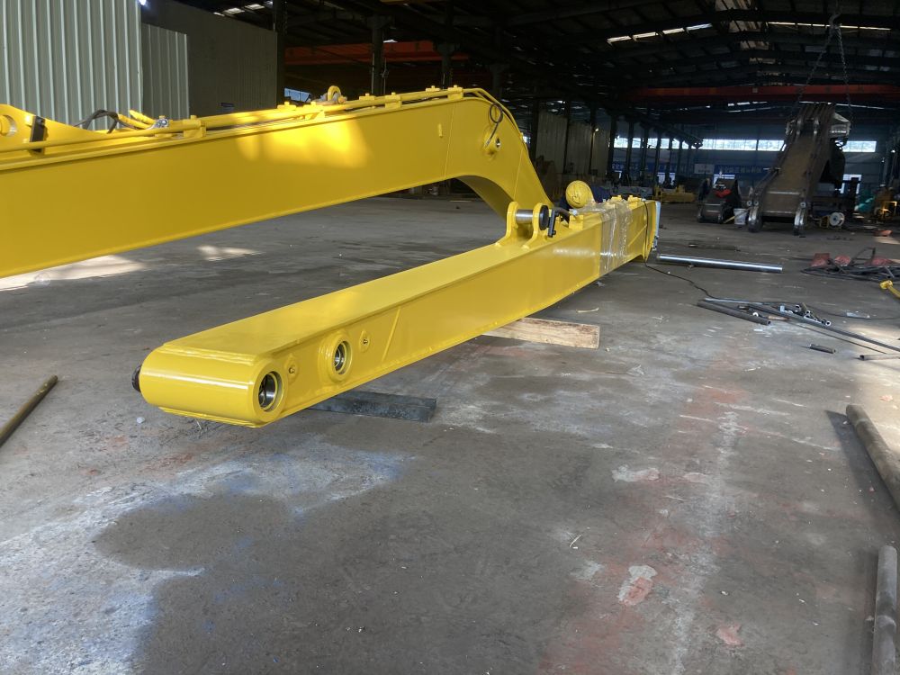 Excavator extension arm for foundation pit, caisson, basement excavation