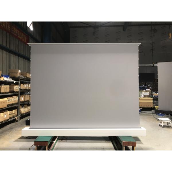 Electric floor-rising projector screen with sleek rectangular housing