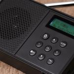 Get Clear Sound On-the-Go with Our Handheld FM Radio Includes Speaker and