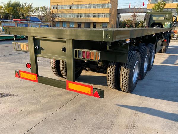 Quality 3 Axles Flatbed Transport Truck Semi Trailer 40FT Container for sale