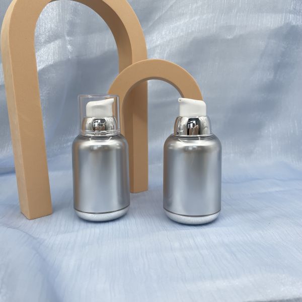Twist 80ml 100ml Airless Pump Bottles Vacuum PP MS Metallized Round Bottom