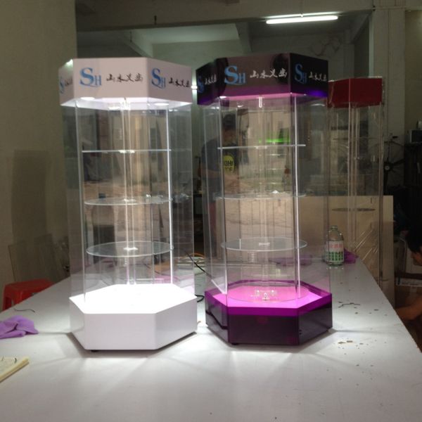 Multi Color Rotary Acrylic Retail Display Stands 4 Storey High Strength Titanium Alloy Material