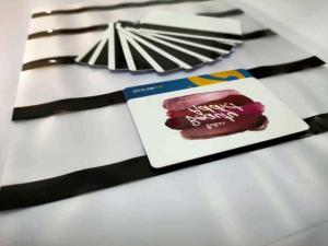 China Black Color Magnetic Stripes Coated Film Hi-Co Magnetic Stripe For PVC Card Lamination on sale