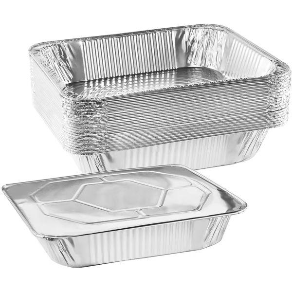 Multiple rectangular pans stacked for storage